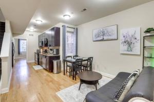 a living room with a couch and a table at Private Room | Temple | Fast WiFi | Kitchen V in Philadelphia