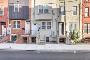 a building on the side of a city street at Private Room | Temple | Fast WiFi | Kitchen V in Philadelphia +5 photos