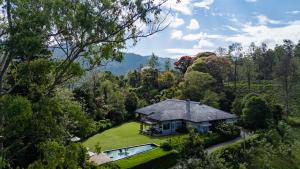 an aerial view of a house in the forest at Nine Skies By Teardrop Hotels in Ella