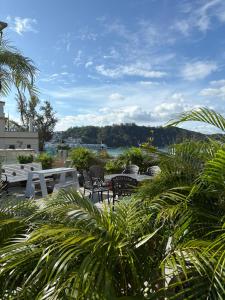 a view of a patio with chairs and tables at Warwick Hotel Cheung Chau in Hong Kong