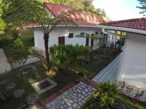 an overhead view of a house with a garden at Skyville Zen Resort,Kundasang in Kampong Kundassan