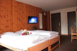 Voodi või voodid majutusasutuse Appartements Monte Rosa toas