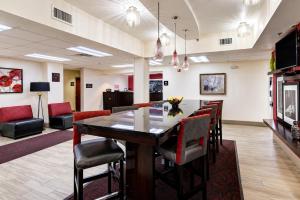 a conference room with a table and chairs at The Antioch Inn in Nashville