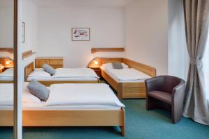 Postel nebo postele na pokoji v ubytování Hotel Oya