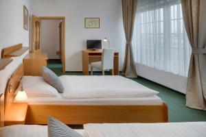 Postel nebo postele na pokoji v ubytování Hotel Oya