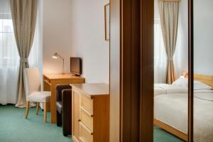 Postel nebo postele na pokoji v ubytování Hotel Oya