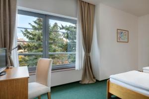 Postel nebo postele na pokoji v ubytování Hotel Oya