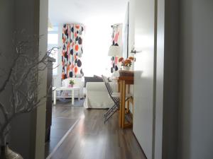 A seating area at GOOD(wo)MAN'S HOME I