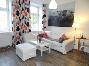 A seating area at GOOD(wo)MAN'S HOME I