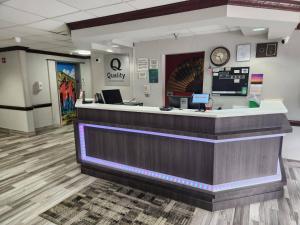 a lobby of a dental office with a reception counter at Quality Inn Overland Park Kansas City in Overland Park +22 photos