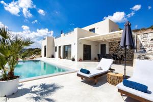 an image of a villa with a swimming pool at Kaliva Villa in Kerames