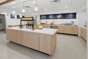 a store with a counter in the middle of a room at Hampton Inn & Suites Pharr in Pharr
