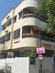 a building with a sign in front of it at Peaceful & hygienic stay , Ideal for working professionals, Great for solo female travelers in Pune +7 photos