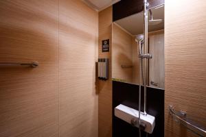 a bathroom with a sink and a toilet in it at Jeonju Wangyijimil Hanok Hotel in Jeonju +36 photos