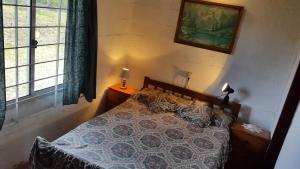 Ένα ή περισσότερα κρεβάτια σε δωμάτιο στο Dipoquito 2