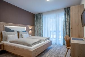 Letto o letti in una camera di Hotel Mathiesn
