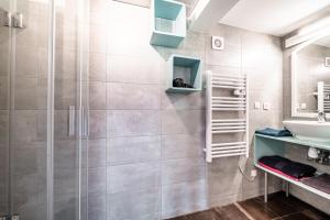 a bathroom with a shower and a sink at Chalet Tante Emma proche Lac Leman in Vacheresse +59 photos