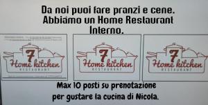 a sign for a home residence with two signs on it at Suite seven &Home Restaurant in Paglieta