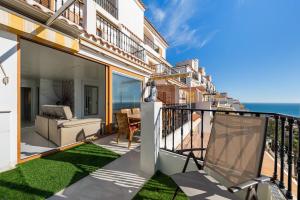 a balcony with a view of the ocean at Tabarca’s View Santa Pola in Santa Pola