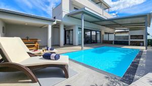 a swimming pool in the backyard of a house at Sea House 1 in Novigrad Istria