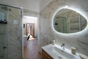a bathroom with a sink and a mirror at L'Incanto dei Monti in Agerola +47 photos