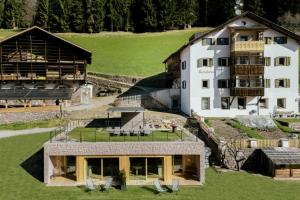 an aerial view of a house and a building at Resciesa Hof in Ortisei