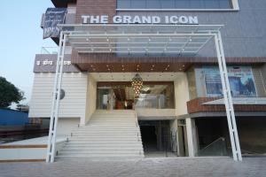 a grand lodge with stairs in front of a building at The Grand Icon in Chandrapur