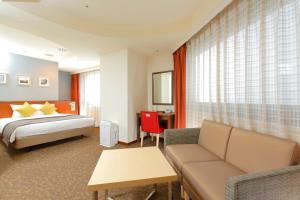 Postel nebo postele na pokoji v ubytování HOTEL MYSTAYS Utsunomiya