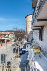 a balcony of a building with a table and chairs at Casa Cortese Sirolo in Sirolo