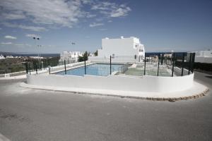 a swimming pool on the side of a building at Vistamojacar in Mojácar