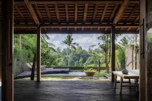 a view from the living room of a villa at Bumi Kabins Ubud in Tegalalang +30 photos