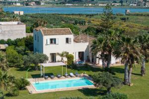 an aerial view of a villa with a swimming pool at Villa Casale by PosarelliVillas in Bisciano