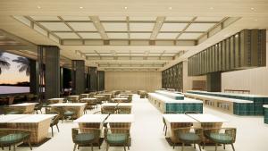 a rendering of a restaurant with tables and chairs at Mövenpick Resort Carita in Serang