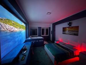 a bedroom with a large bed and a large window at Suite al mare in Taranto +27 photos