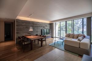 a living room with a couch and a table at Kozue in Kutchan +57 photos
