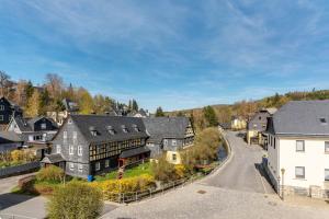 an aerial view of a residential neighborhood with houses at Ferienwohnung im ehem Rittergut in Wurzbach