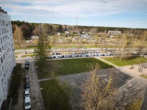 a view of a parking lot from a building at Panorama View Suite in Jelgava