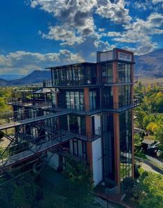 an aerial view of a building with balconies at Chiko Group in Aspindza