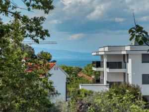 a view of the ocean from a building at Jellyfish in Malinska