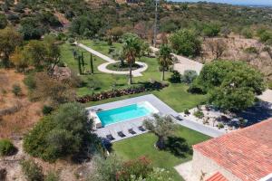 an aerial view of a villa with a swimming pool at Villa Isabelle by Algarve Holidays - Loule in Loulé