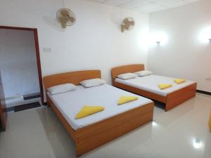 Postel nebo postele na pokoji v ubytování K Holiday