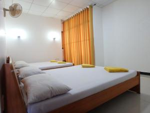 Postel nebo postele na pokoji v ubytování K Holiday