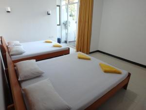 Postel nebo postele na pokoji v ubytování K Holiday