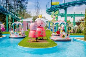 a water park with three rides in the water at Settle in Southampton - Stylish Self Check-In Rooms & Suites in Southampton