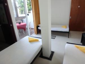 Postel nebo postele na pokoji v ubytování K Holiday