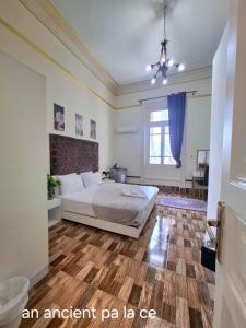 an apartment bedroom with a bed and a window at An ancient pal ace in Cairo