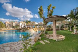 a resort with a swimming pool and a resort at El Safwa Resort New Cairo in Cairo