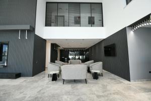 a meeting room with chairs and a table in a building at Dorana Hotel Gazimagusa in Famagusta