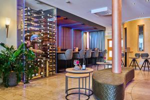a room with a bunch of wine racks at Landhotel Geyer in Kipfenberg