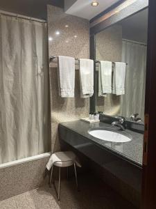 a bathroom with a sink and a shower at Europa Dépendance in Isernia
